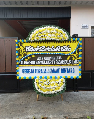 Papan Bunga Duka di Linggang Bigung